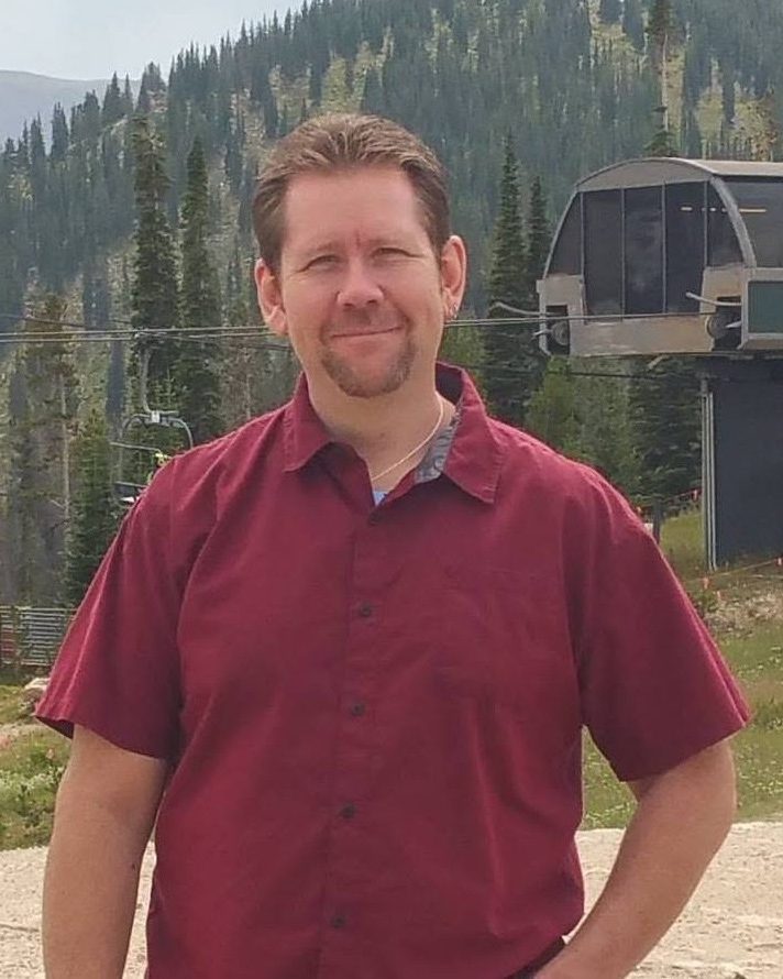 Kirk Flathers outdoors in the Colorado mountains