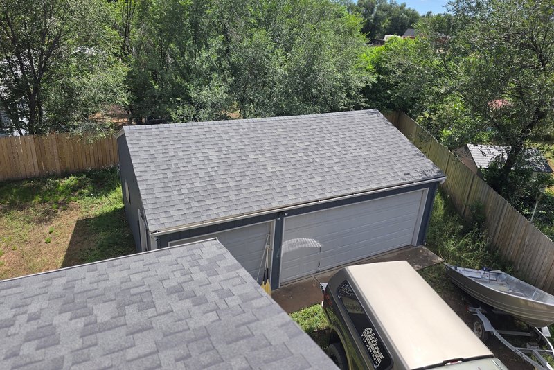 Gray shingle roof over a detached garage